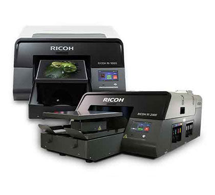 Two Ricoh printers side by side