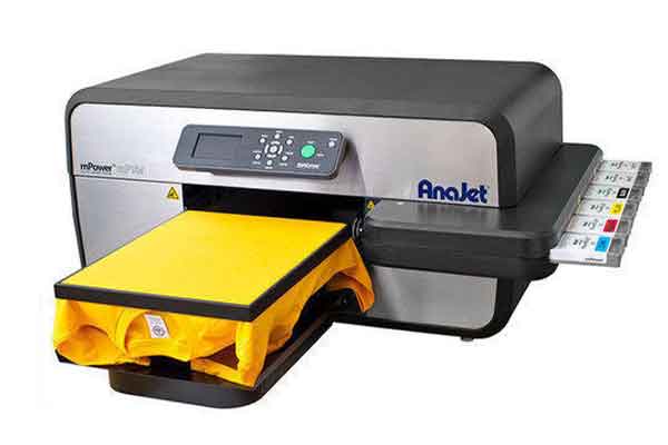 Anajet printer with a yellow shirt ready for printing 