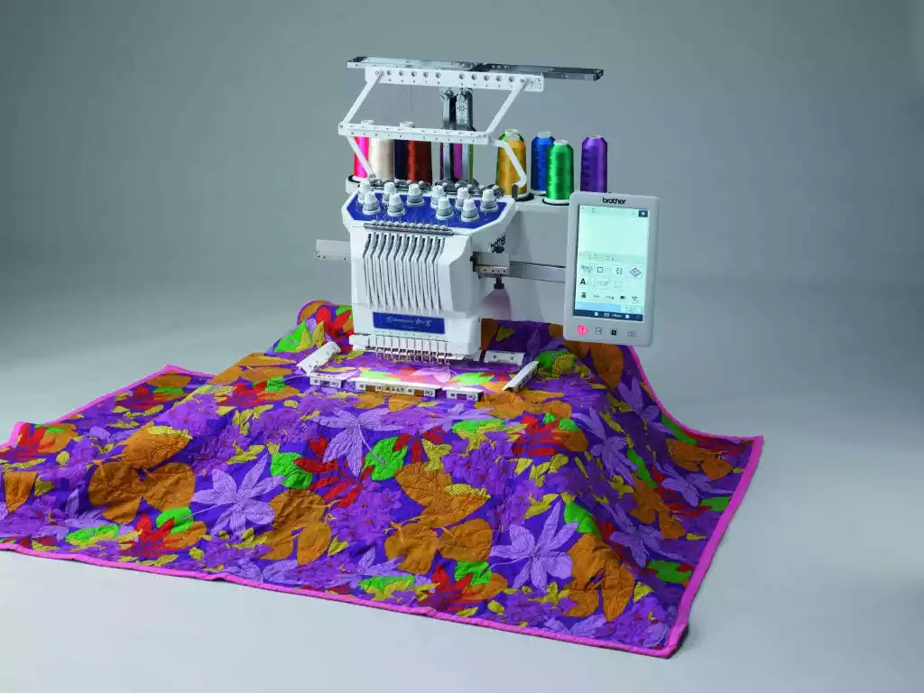 PR1055x embroidery machine embroidering on a quilt
