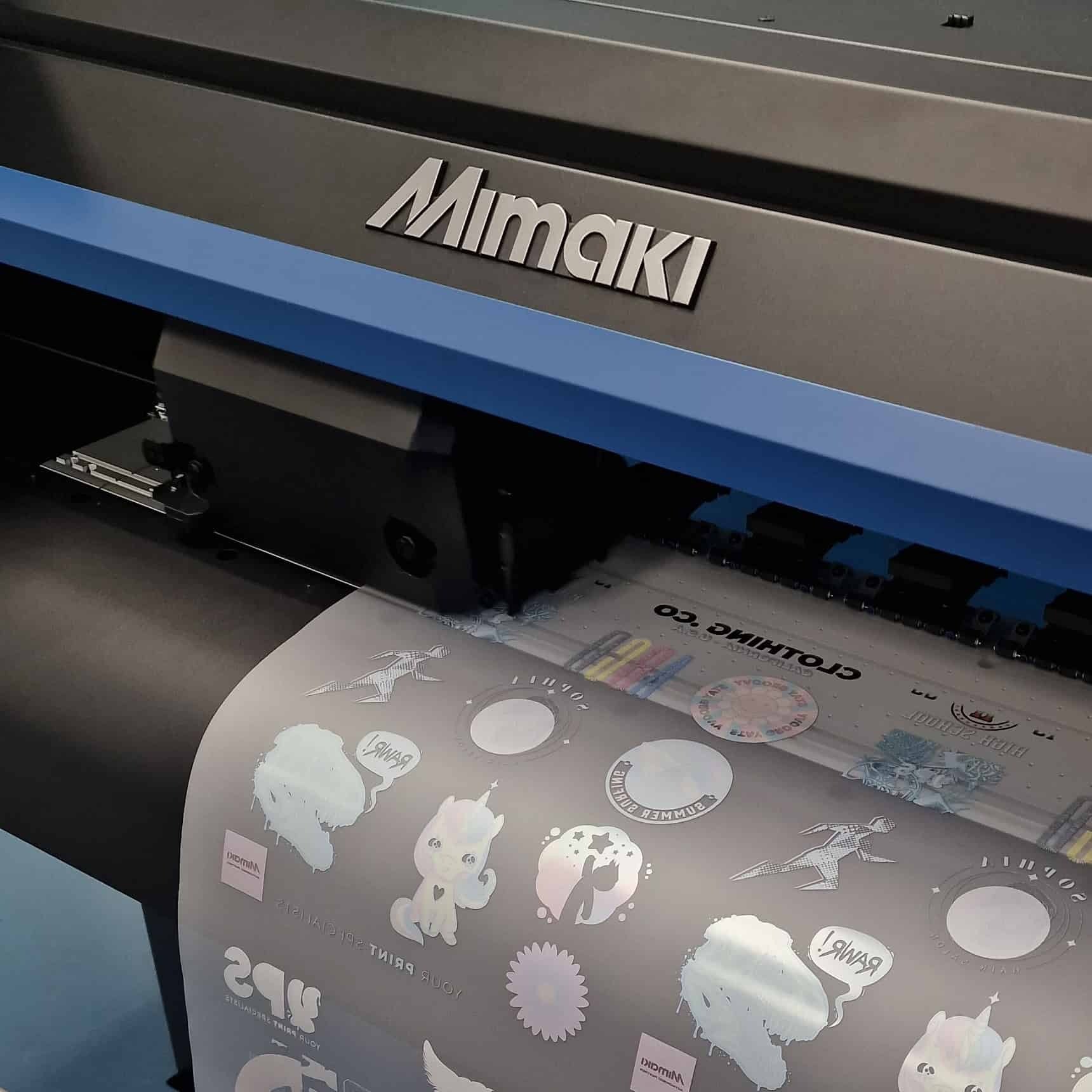 Mimaki TxF 300-75 Printer Zoomed in with Media showing bring printed on